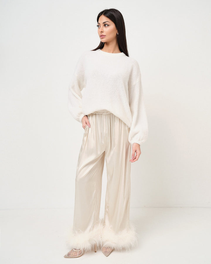 Pantalone in raso con piume